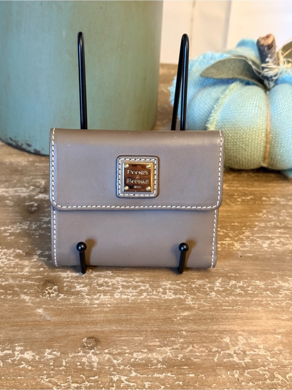 NWOT: Dooney & Bourke Taupe Leather Compact Wallet with Gold Logo Plaque